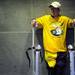 Neil Sauter, 29, of Blissfield, smiles as he prepares to jump on on his stilts. The long legs make him around nine feet tall. Melanie Maxwell I AnnArbor.com